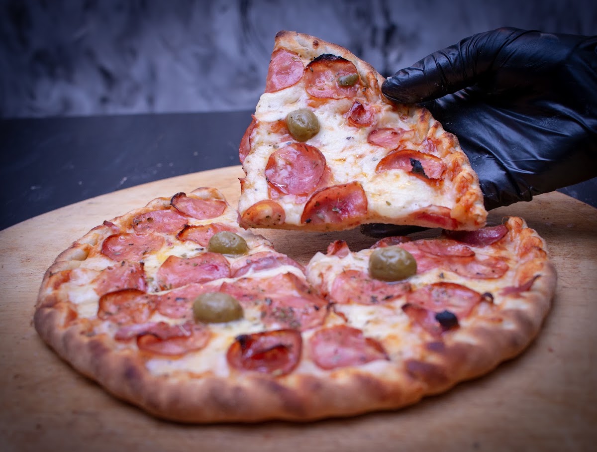 NEW PIZZARIA